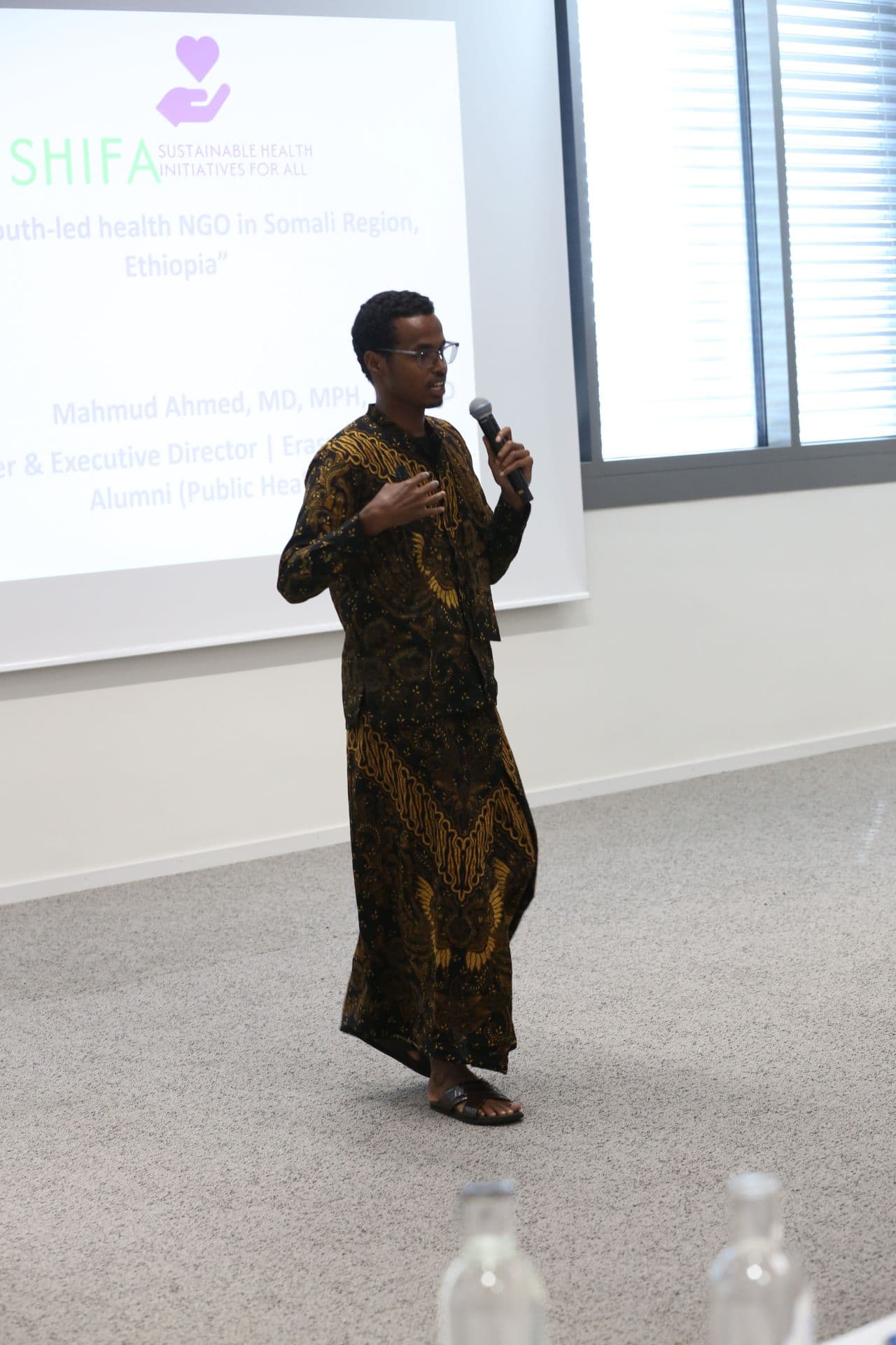 A SHIFA outreach team member supporting a community health initiative