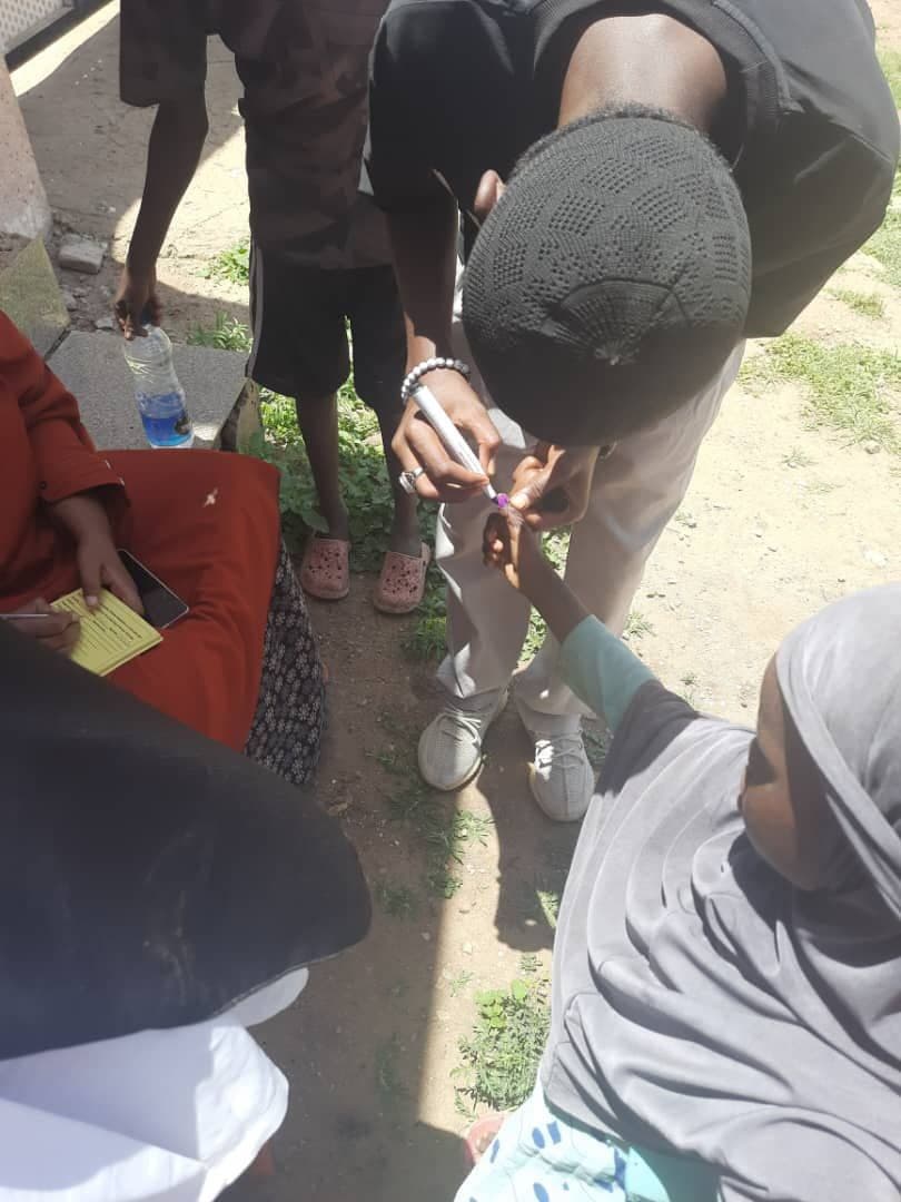 A SHIFA field health worker engaging with the community during a health campaign